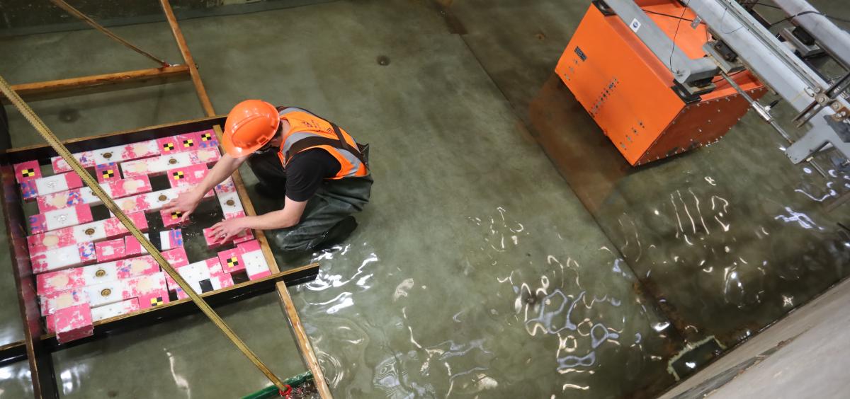 Preparing tsunami debris for debris flow test.